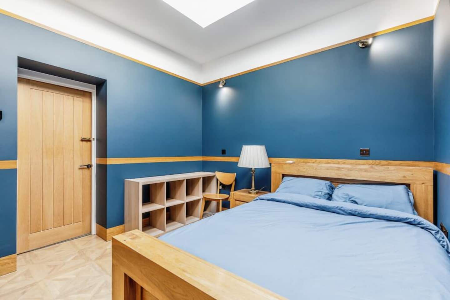 Double bedroom with electric Velux skylight and blackout blind — Belmont Deco Noir Ground Floor Suite Bristol