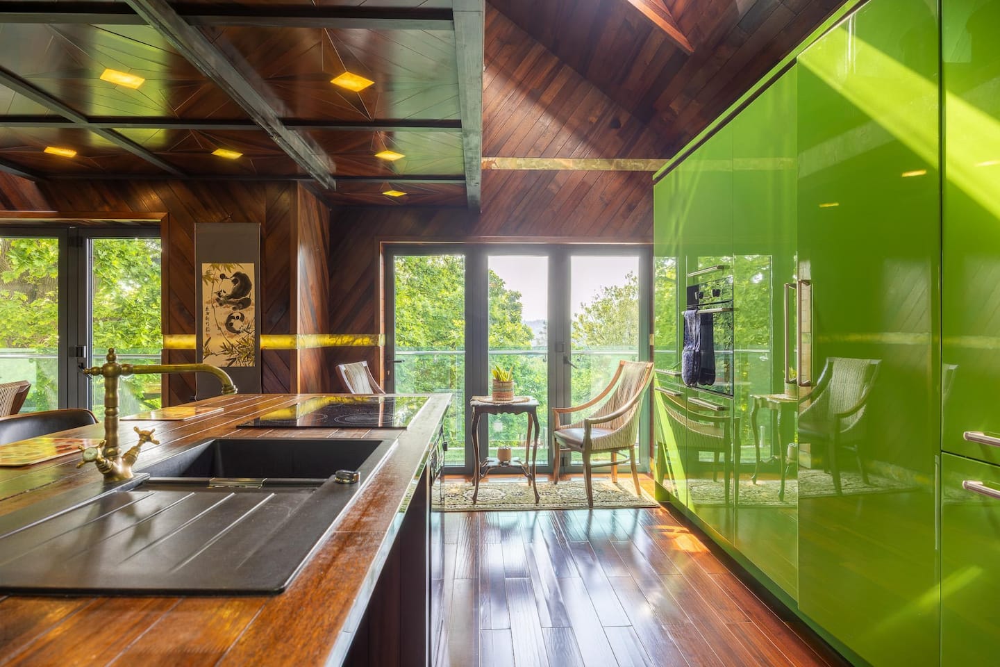 Bespoke Colonial Cuban kitchen with bi-folding doors opening to balcony — penthouse Bristol